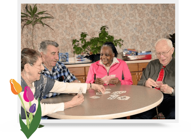 residents playing a card game